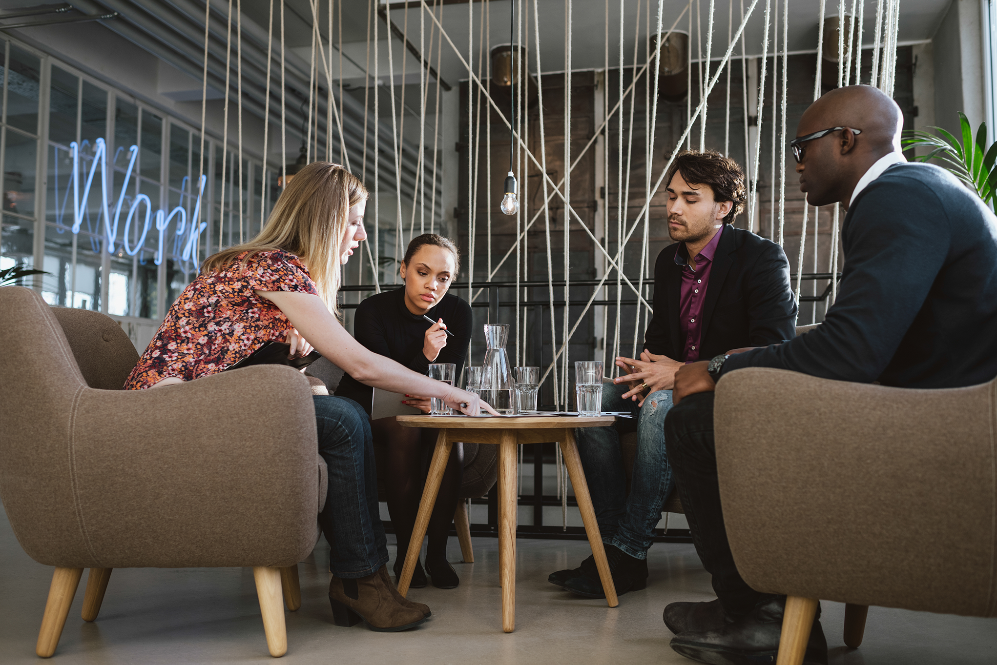 diverse-group-of-executives-discussing-business-2024-09-17-21-18-39-utc 1